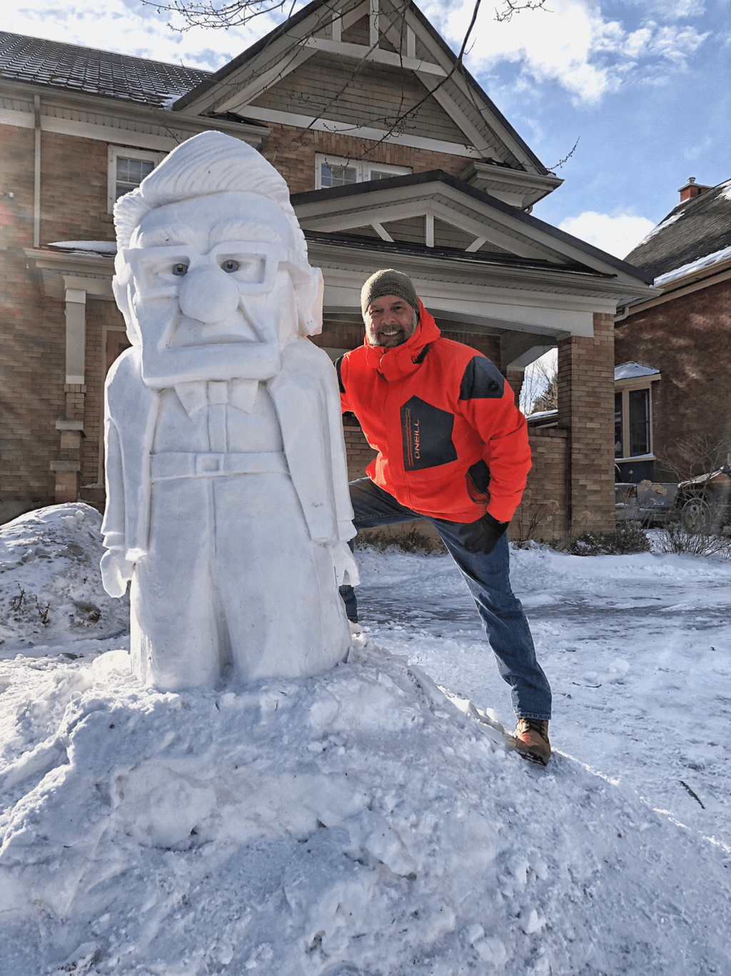 the snow sculptor Matt Morris with one of his impressive ice sculptors