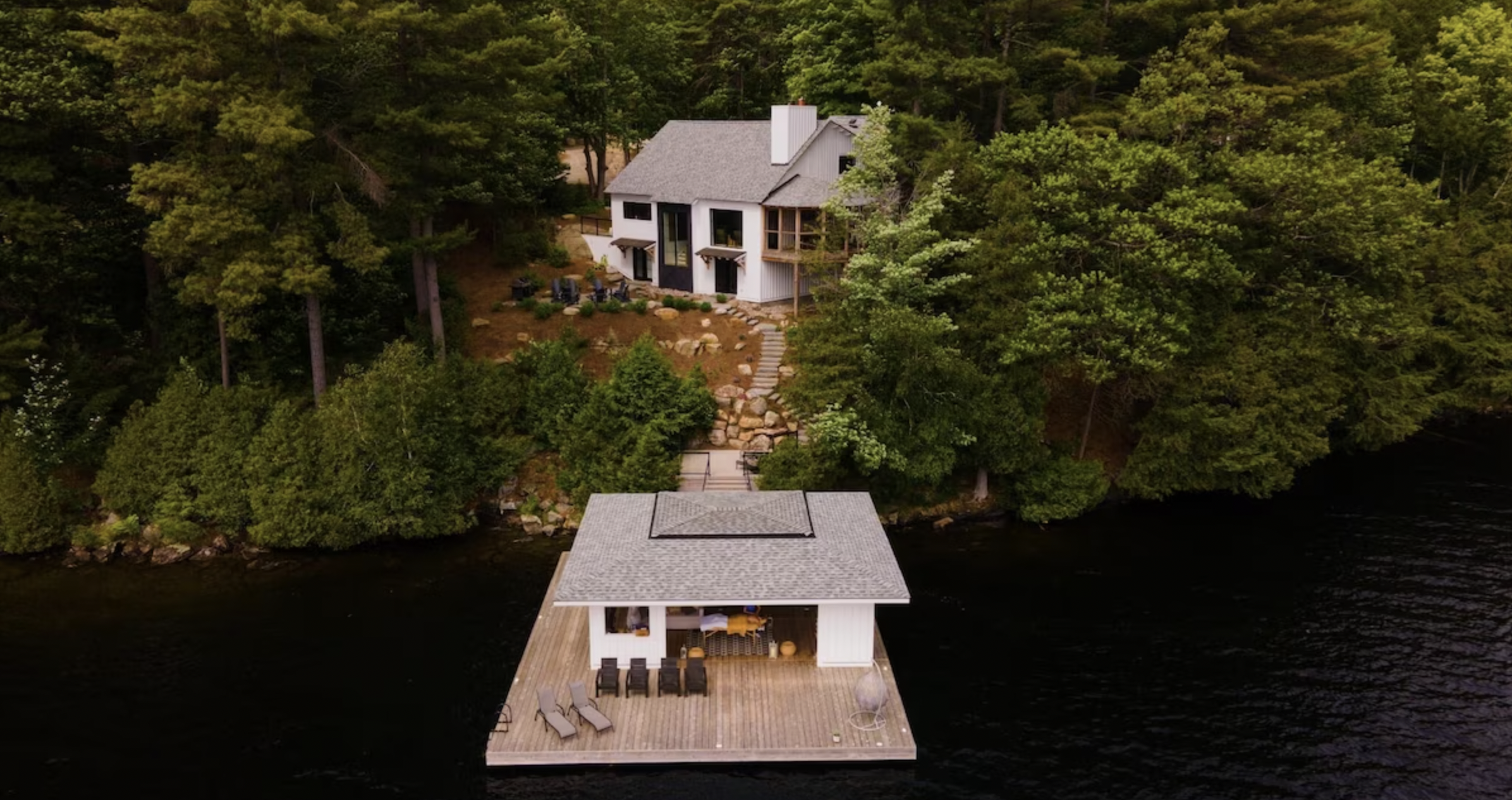 bird's eye view of the dock and cottage