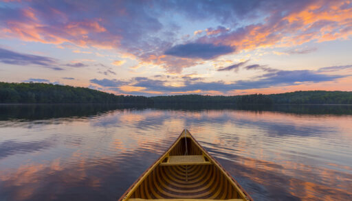 A canoe on the lake, photo taken from paddler's point of view